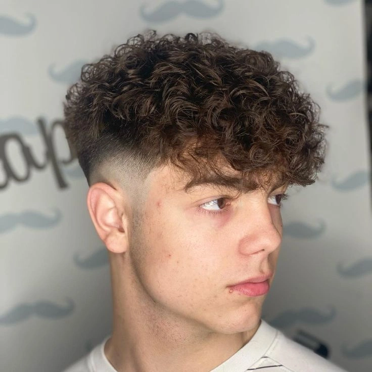 French Crop Haircut Guide: How to Get the Perfect Look 6 Curly top and skin sides